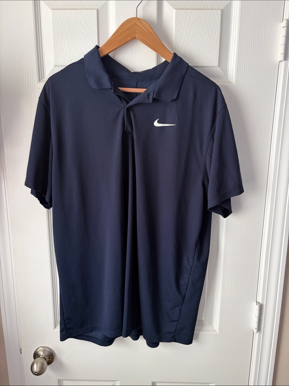 Nike Men’s Navy Polo with White Swoosh